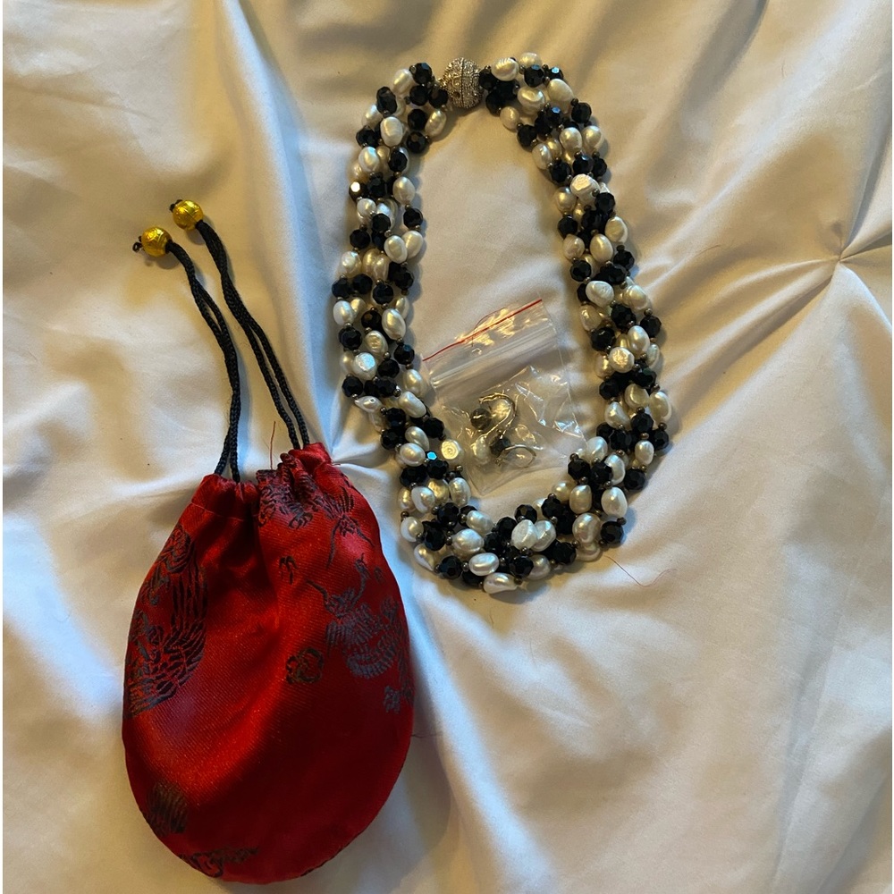 Vintage black and white pearl necklace with matching earrings